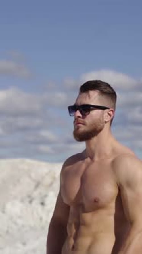 Shirtless Man Posing in the Sun