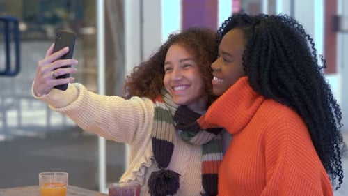 Friends Taking Selfie Together in Urban Setting
