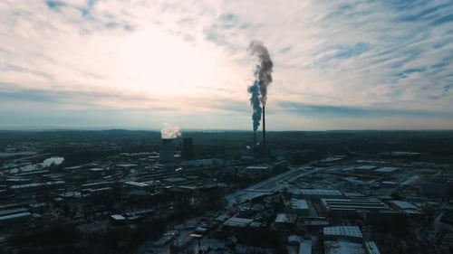 Coal Fired Power Station. Aerial view of high chimney pipes