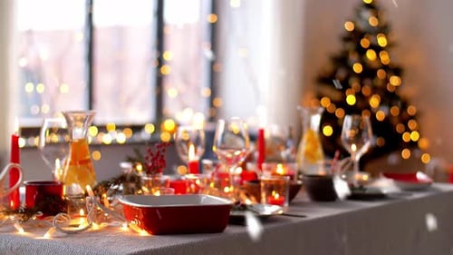 Holiday Table Setting with Christmas Tree Background