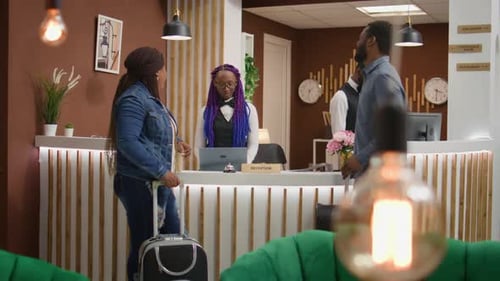 Hotel Concierge Welcoming Guests