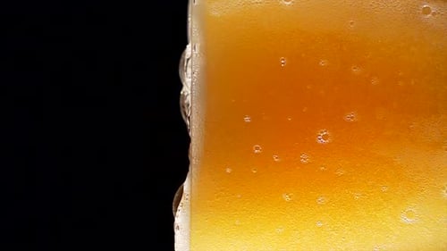 Bubbles in a Glass of Refreshing Beer