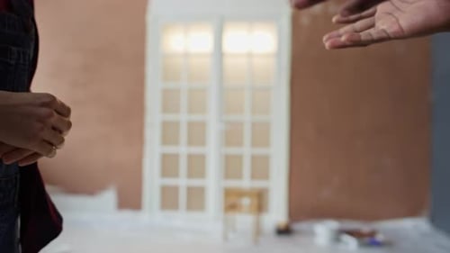 Close-up of Handshake After Home Renovation Agreement