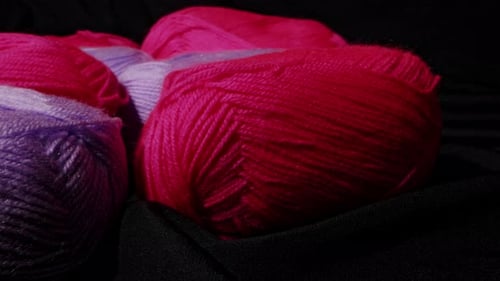 Yarn for Knitting A Ball of Thread on a Black Background