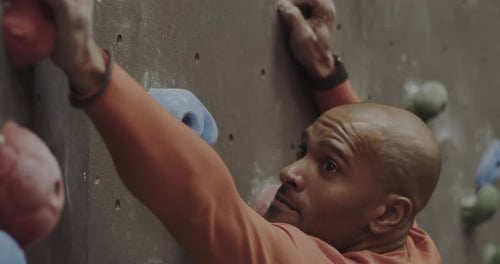 Adult Man Indoor Rock Climbing Close Up