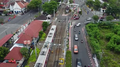 Aerial Drone Shot of Yogyakarta City Train Traffic Landscape, Indonesia.