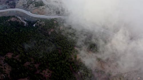Foggy Mountain Road and Forest Aerial View