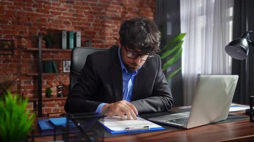 Focused Professional Writing Notes in Modern Office