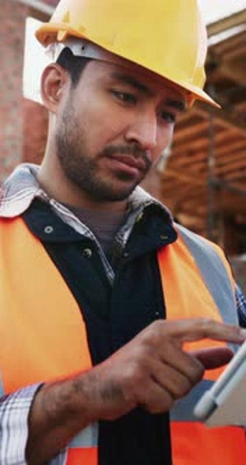 Construction, man or typing on tablet outdoor for timesheet review, labor report or renovation