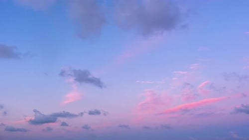 Clouds Moving in Pink and Blue Sky