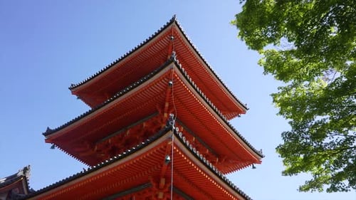 Traditional Wooden Japanese Multi-Storey Pagoda Painted in Red at Kiyomizu-Dera Temple in Kyoto