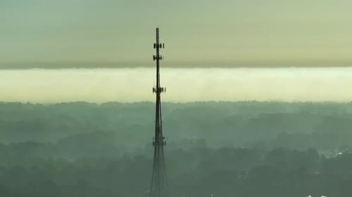 Aerial View of Telecommunications Cell Phone Tower with Wireless Communication 5g Antennas for