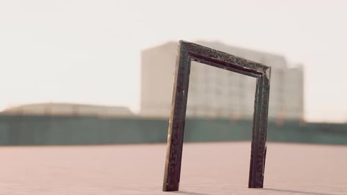 Empty Wooden Picture Frame on the Beach Sand
