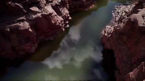 Exploring the Serene Depths of the Colorado River in a Remote Canyon