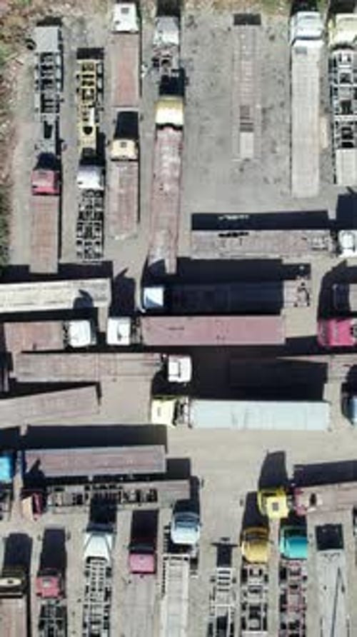 Aerial View of Semi-Trucks Parked in an Urban Lot