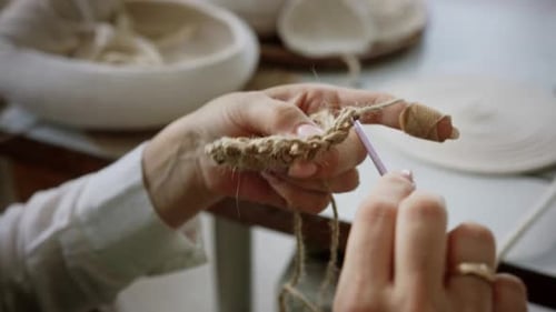 Hands Crocheting with Yarn Hook Craft