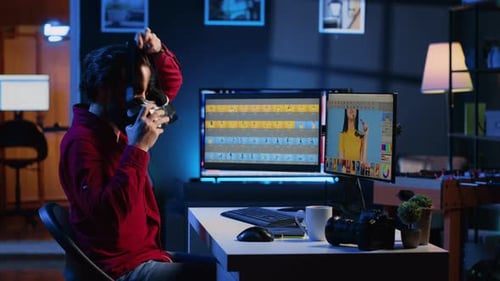 Photo Editor Using VR Headset to Color Correct Photographs in High Tech Creative Studio
