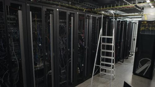 Server Rack Row with Maintenance Ladder in Modern Data Center