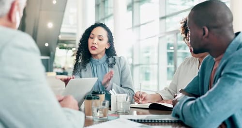Business Team Meeting in Bright Office Space
