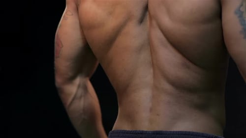 Man Knead the the Back Muscles