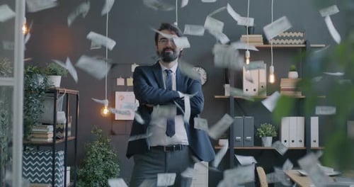 Loop of Successful Middle Eastern Businessman Standing in Office While Cash Money Flying Up and Down
