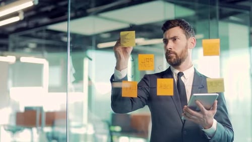 serious businessman analyst develops a strategy for enterprise, financial growth thinking make start