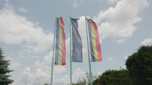 Flags of Romania and European Union Waving