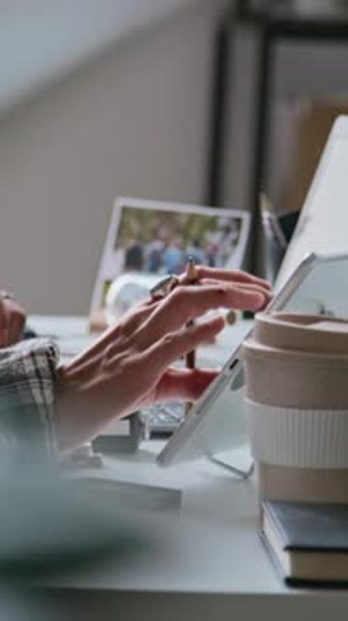 Hands of Unrecognizable Female Programmer Working on Tablet and Laptop