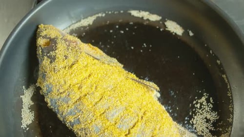 Close Up of Fish Frying on a Pan Concept Tasty Food