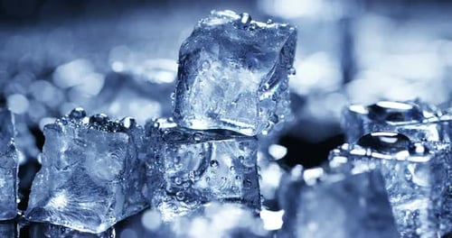 Macro Shot of Clear Ice Cubes With Water Droplets