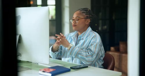 Woman Working at Computer in Home Office