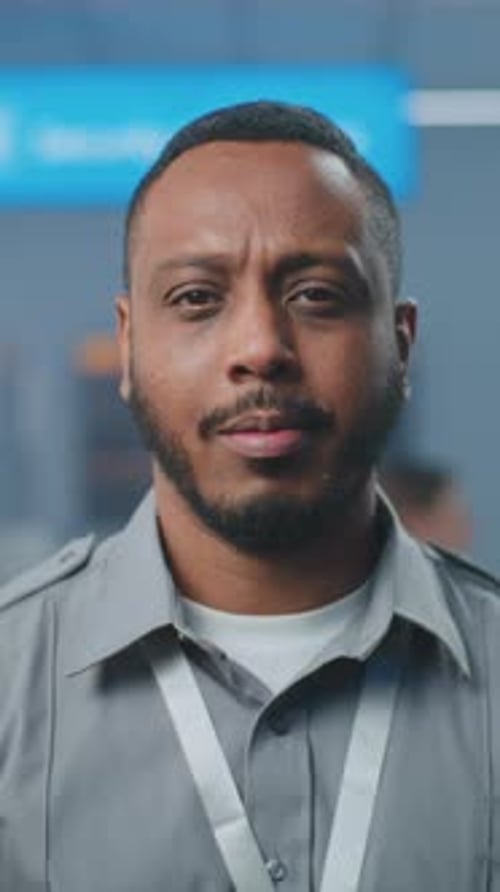Airport Security Checkpoint Portrait of Security Officer in Uniform Looking at Camera