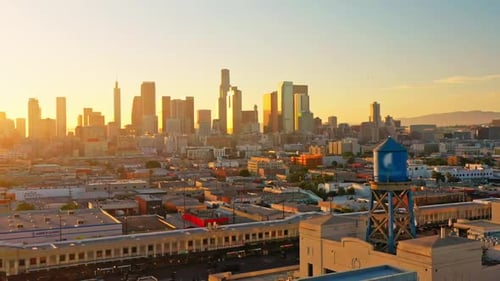 Los Angeles, california in beautiful orange sunset skyline, aerial rotate