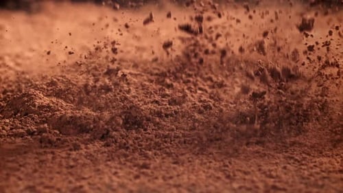 Cocoa Powder Falls on the Table Filmed on a Highspeed Camera at 1000 Fps