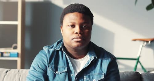 Portrait Young African American Man Look at Camera Feel Serious Sad Face Close Up Slow Motion at