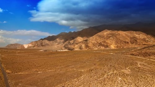 Rising above the deserted landscape surrounded by bare mountains. Dry hot scenery of Nevada.
