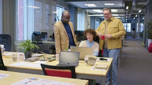 Colleagues Meeting in a Modern Office Space