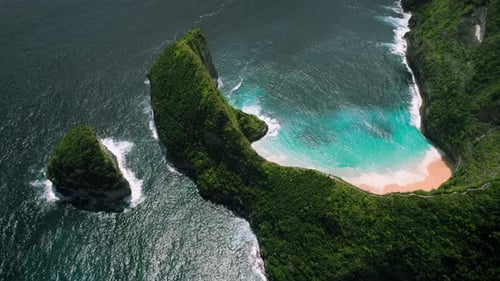Clear Sea on Kelinking Beach in Nusa Penida Island Bali Indonesia Mountain Range Sticks Out on