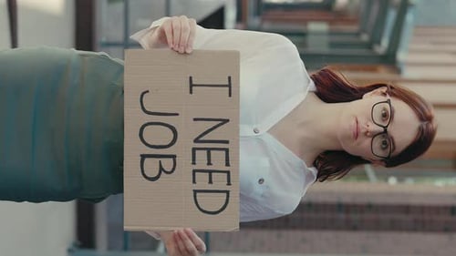 Woman Holds Job Search Sign