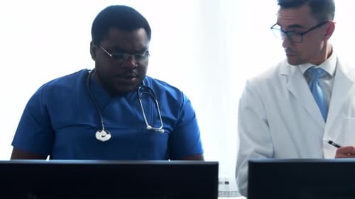 Doctor and Surgeon Talking Near Window Medical Workers in Hospital Office Day Light Healthcare