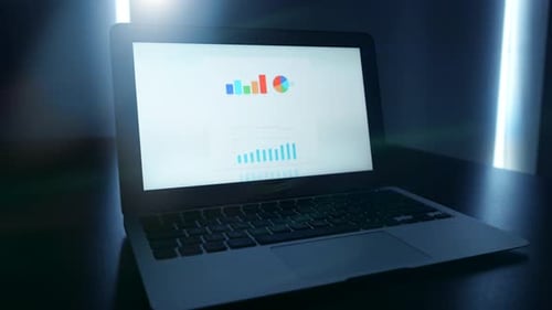 Modern Laptop Displaying Bright Graphs