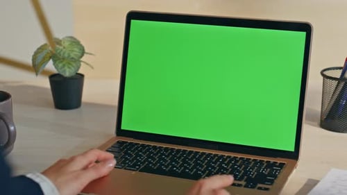 Unknown Person Talking Online Looking Laptop Green Screen in Office Closeup