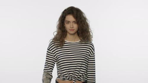 Girl Showing Ok Sign In Studio. Portrait Of Young Woman Showing Ok Gesture On White Background. P...