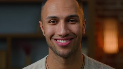 Young Man Smiling Directly at the Camera