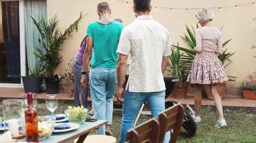 Friends Gather for Backyard Barbecue and Celebration