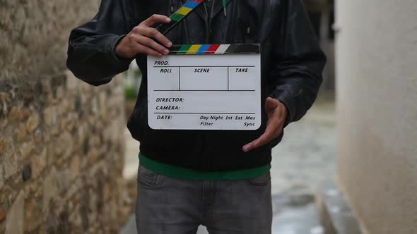 Blank Customizable Clapper Board Being Held Up And Clapped By Male ...