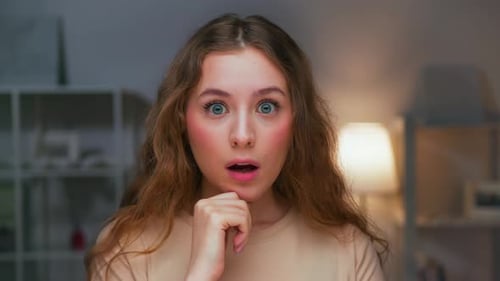 Woman Close Up Thinking and Looking at Camera