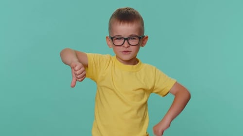 Upset Toddler Children Boy Showing Thumbs Down Sign Expressing Discontent Disapproval Dislike