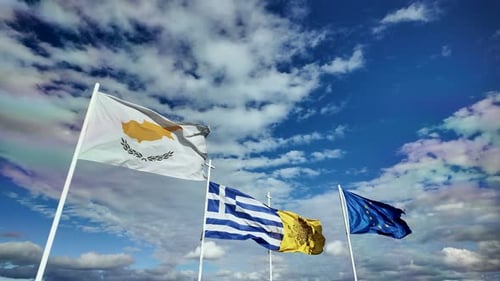 Flags of Cyprus, Greece, and EU Waving in Wind