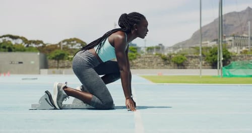 Strong sportswoman runs with speed and strength, professional endurance training for a marathon